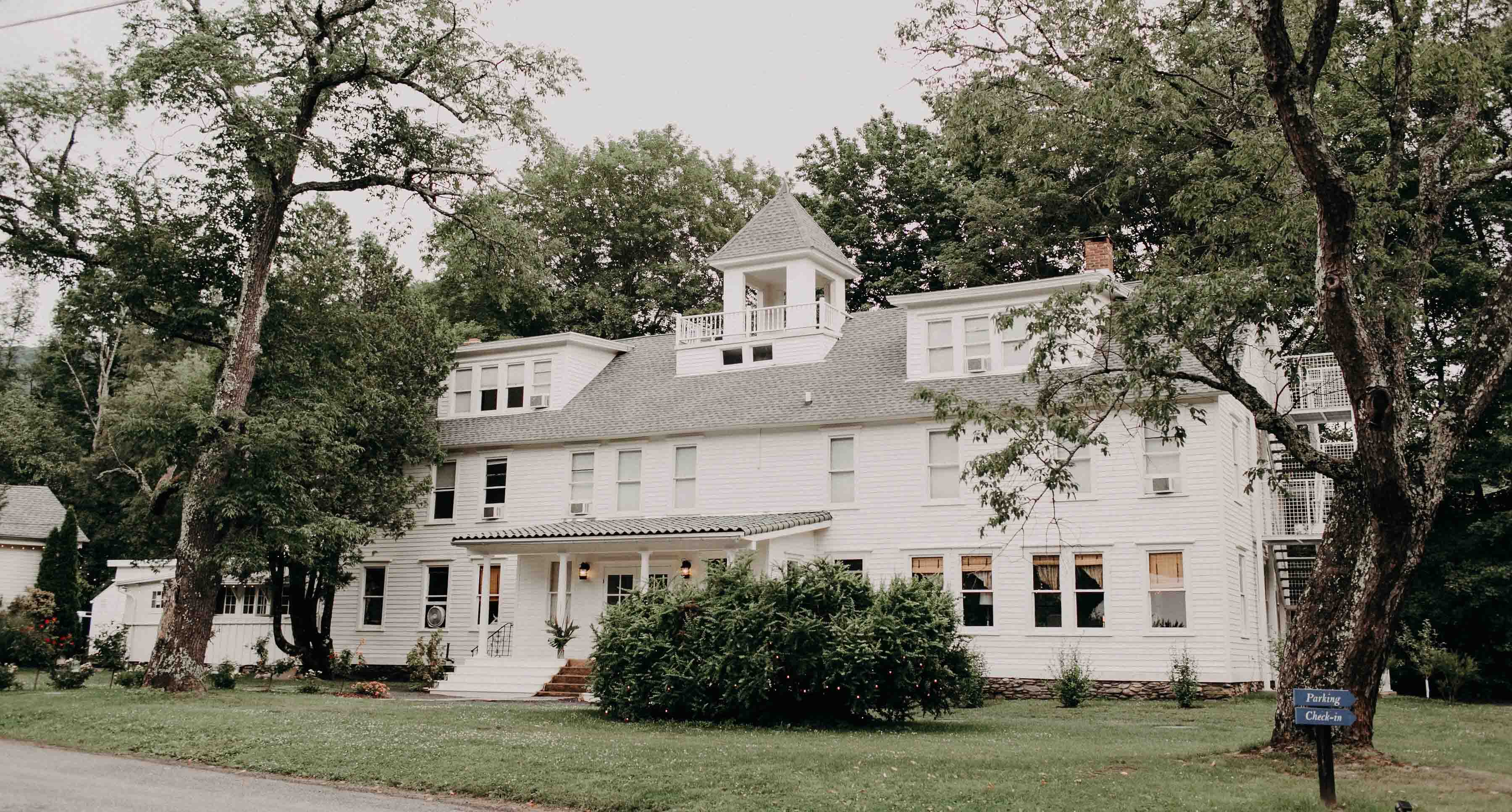 Bride and groom walking together at a Catskills wedding venue
